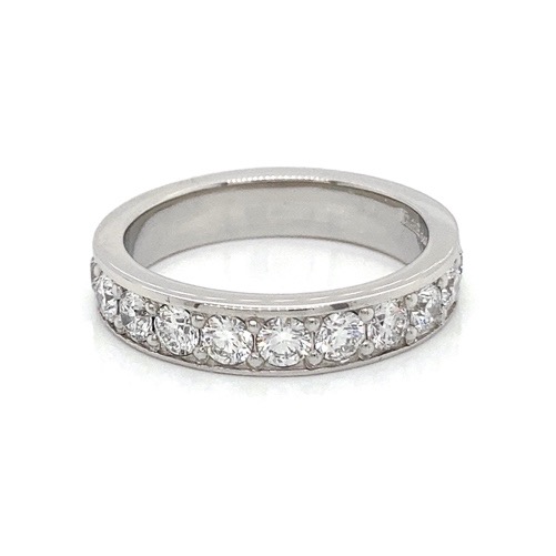 A silver ring with diamondsDescription automatically generated